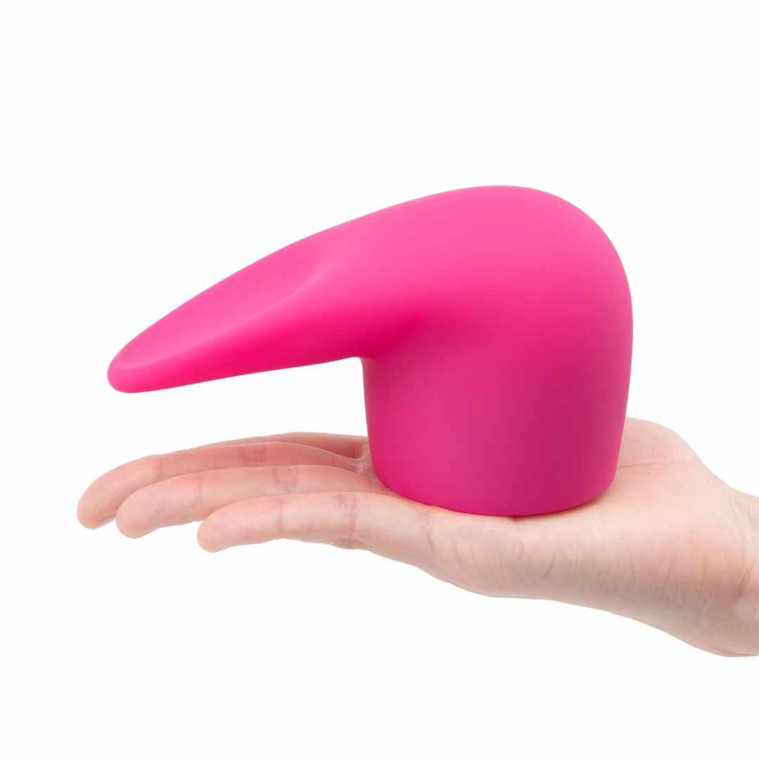 Rosa Aufsatz in einer Hand gehalten. Silikon, mit abgewinkeltem Teil.