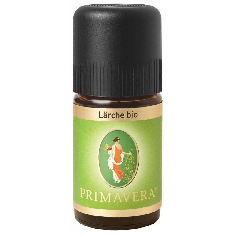 Flacone di vetro marrone con tappo nero. Etichetta verde con "Lärche bio" e "PRIMAVERA". Illustrazione di donna.