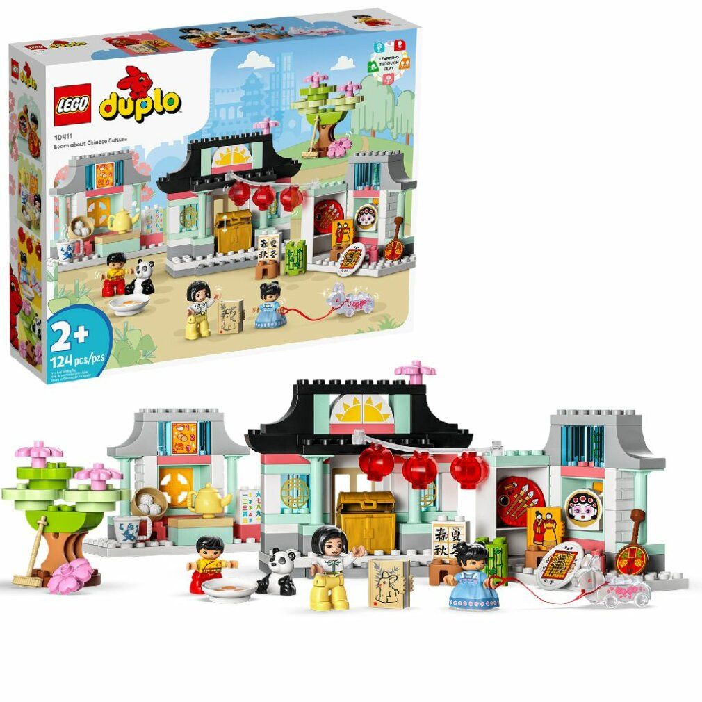 LEGO Duplo Set. Enthält Gebäude, Figuren und Zubehör. Verpackung mit Produktname und Altersempfehlung.