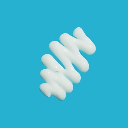 Weißes Creme-Muster auf blauem Hintergrund. Zickzack-Form.