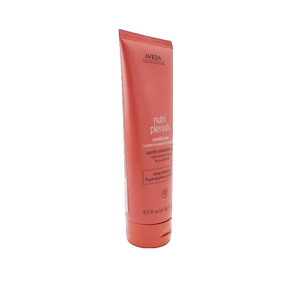 Rote Tube, Aveda Nutriplenish Conditioner. Text und Logo sichtbar.