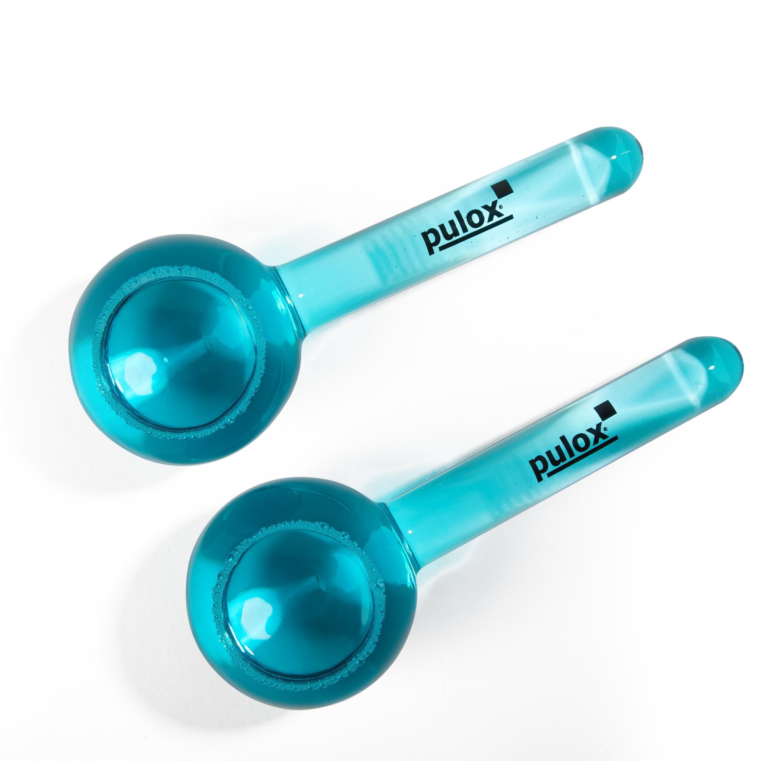 Zwei blaue, kugelförmige Glas-Gesichtsmassagekugeln mit Griff. Auf dem Griff steht "pulox".