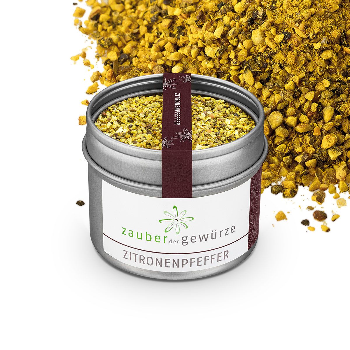 Geöffnete Dose Zitronenpfeffer. Aufschrift: Zauber der Gewürze, Zitronenpfeffer. Dunkelrotes Etikett mit Produktnamen. Gewürz verstreut.