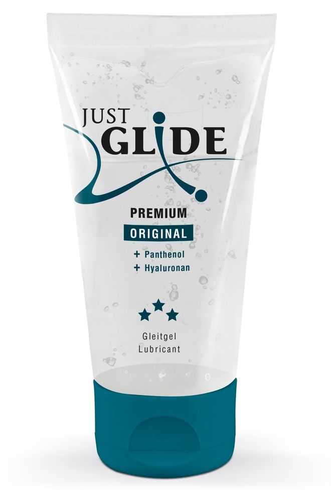 Transparente Tube mit blauem Verschluss. Aufschrift: JUST GLIDE PREMIUM ORIGINAL. Enthält Panthenol und Hyaluronan. Gleitgel.