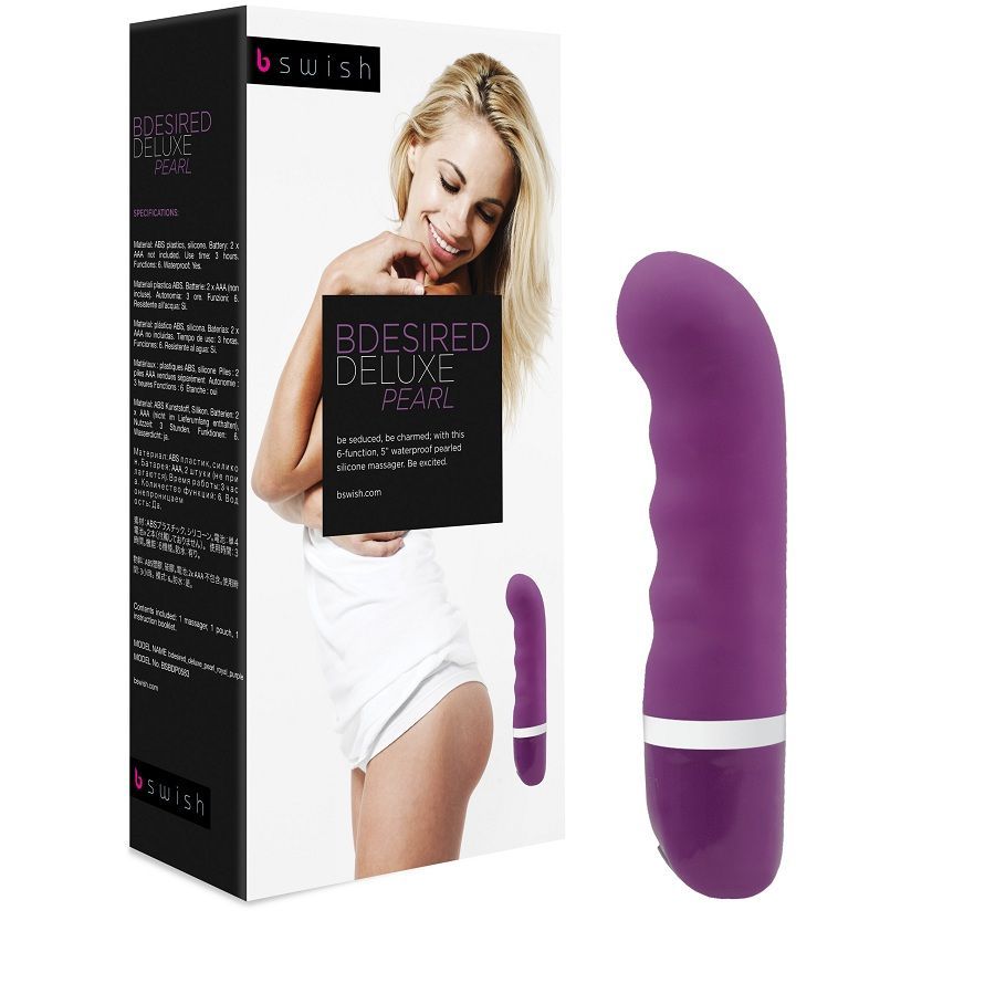 Lila Vibrator neben Verpackung. Verpackung mit Produktabbildung und Text. Produktname: B Swish. Aufschrift: B Desired Deluxe Pearl.