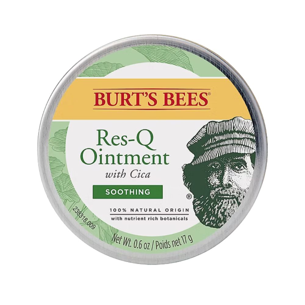 Runde Dose mit Deckel. Aufschrift: BURT'S BEES Res-Q Ointment, mit Cica, beruhigend. Enthält 17 g. Abbildung eines Mannes.