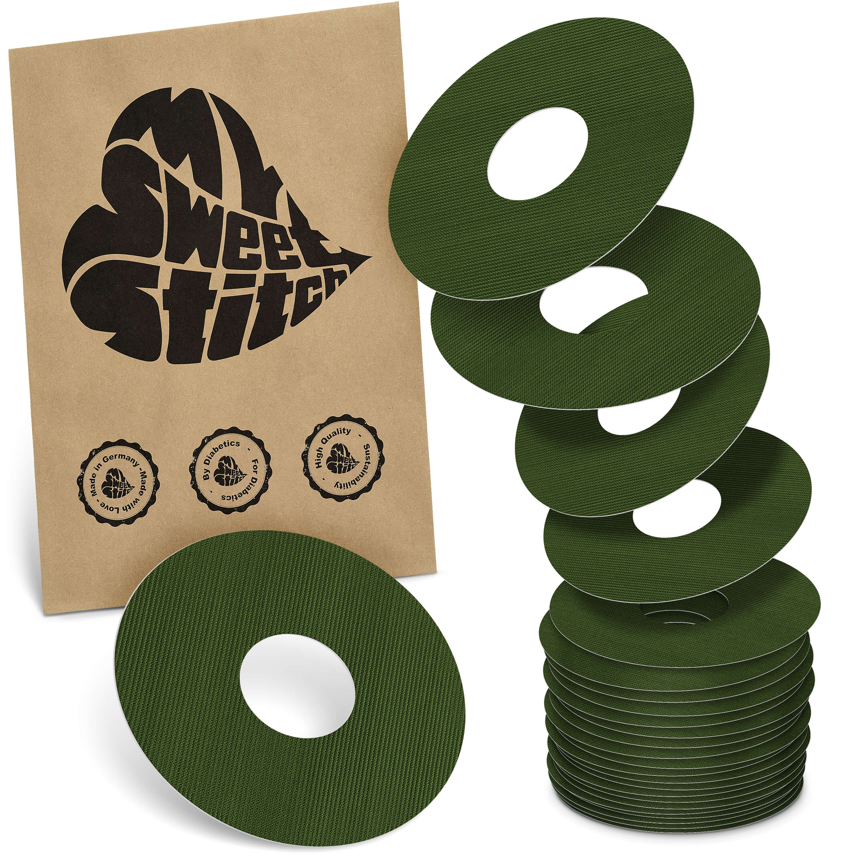 Grüne, runde Katheterpflaster mit zentralem Loch. Verpackung mit Logo "MySweetStitch" und Qualitätssiegeln.