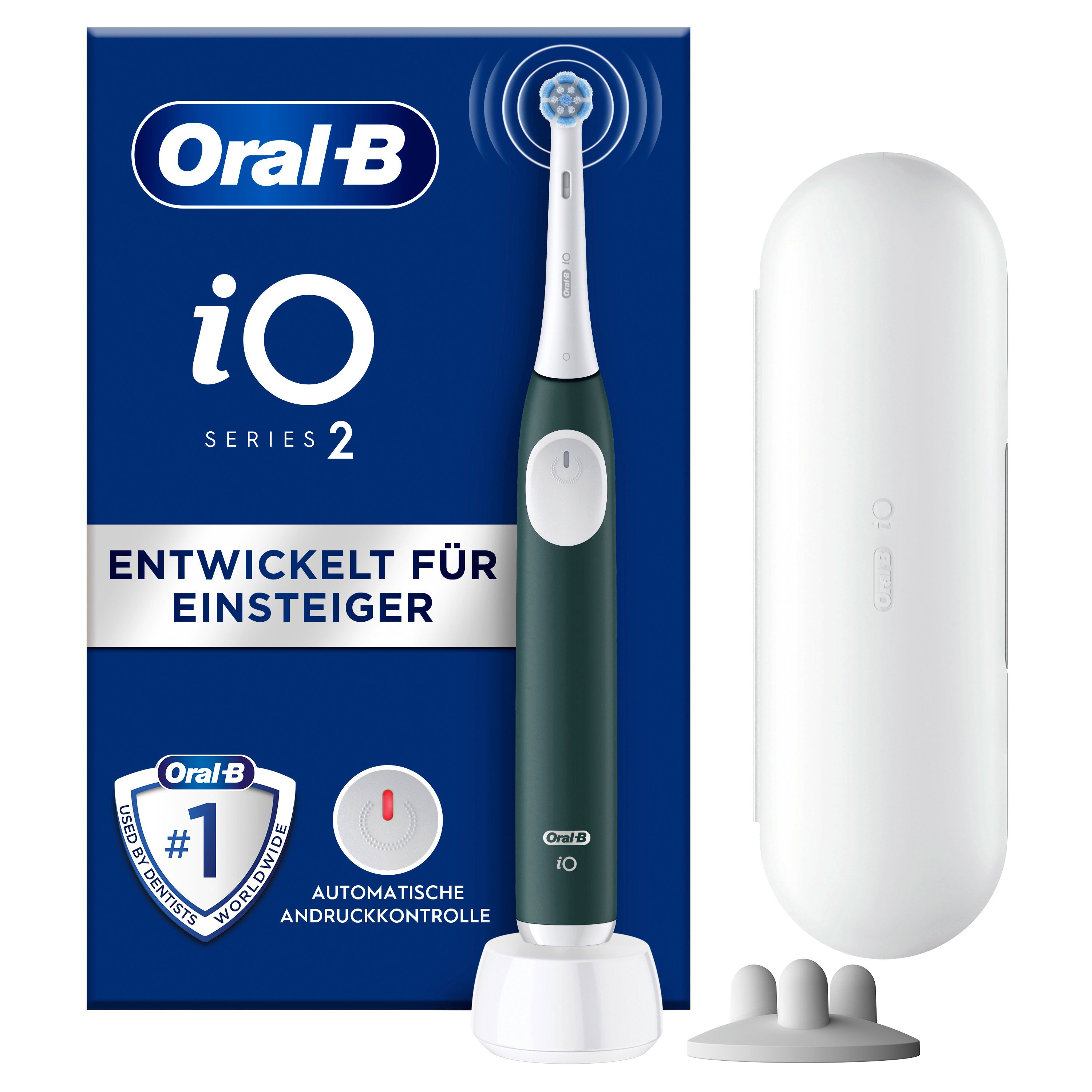 Elektrische Zahnbürste mit grünem Griff, weißem Bürstenkopf und Ladestation. Reiseetui und Ersatzbürsten sind ebenfalls enthalten. Verpackung mit Logo.