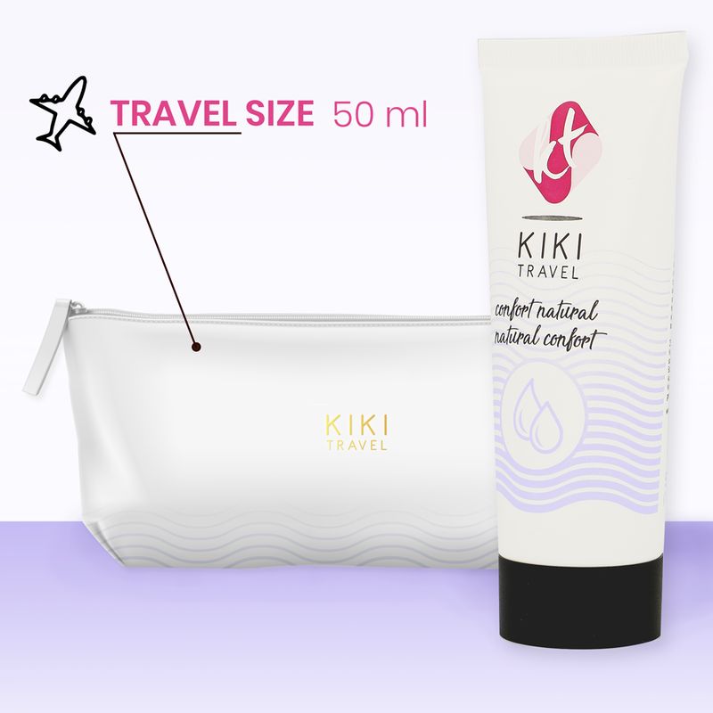 Tube Gleitgel neben weißer Kosmetiktasche. Aufschrift: KIKI TRAVEL, confort natural. Travel Size 50 ml. Schwarzer Verschluss.
