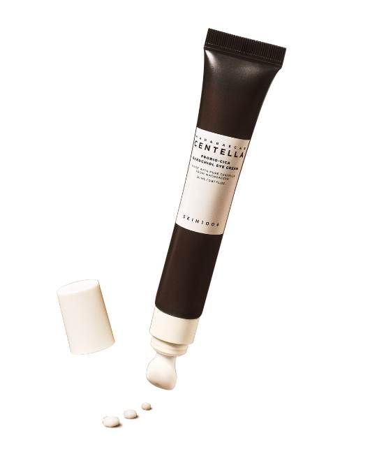 Creme-Tube mit weißem Applikator. Schwarzer Tube mit weißer Schrift. Produktname: SKIN1004 Madagascar Centella Probio-Cica Bakuchiol Eye contour cream.