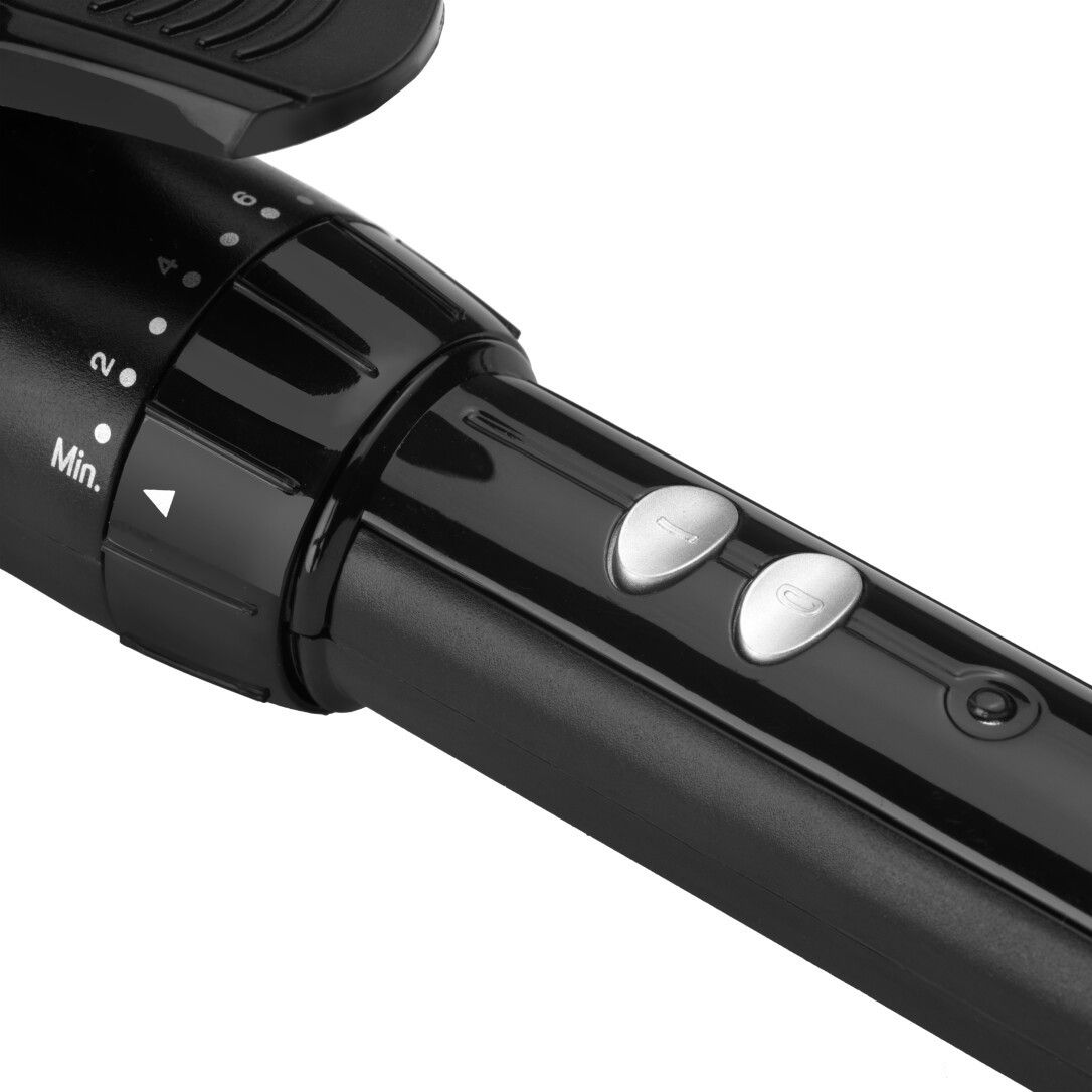 Nahaufnahme des Griffs eines Lockenstabs. Schwarzes Gehäuse mit Temperaturreglern und Einstellrad.