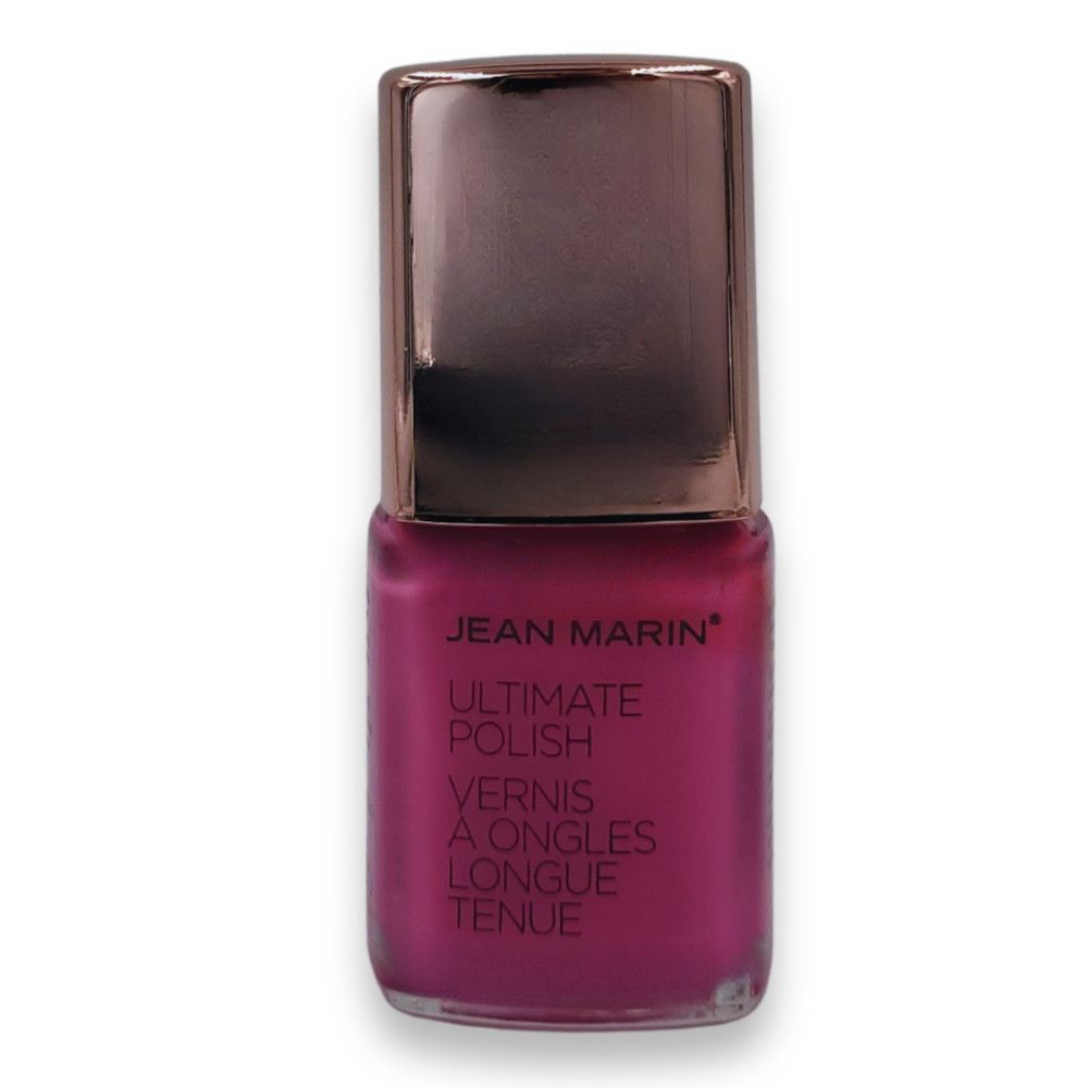 Nagellackflasche von Jean Marin Ultimate Polish. Rosa Farbe mit silberner Kappe. Text: Vernis à Ongles Longue Tenue.
