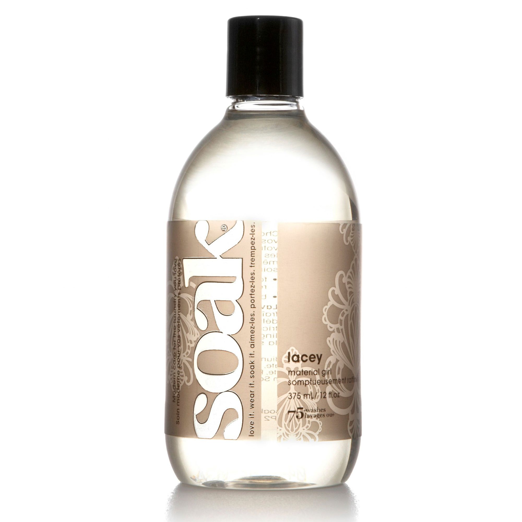 Klare Flüssigkeit in einer Flasche mit schwarzem Deckel. Aufschrift "soak" und Produktbezeichnung.