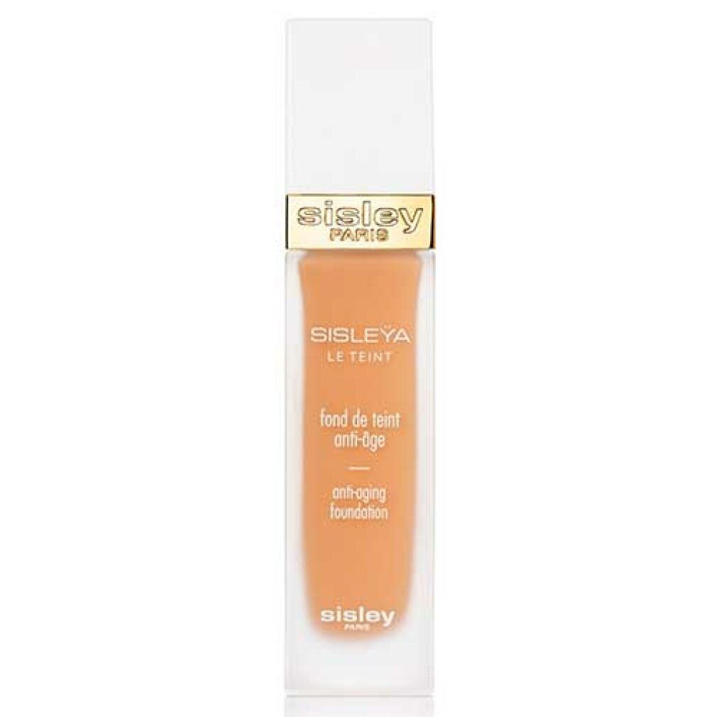 Sisley Sisleya Le Teint Foundation. Flasche mit Farbton. Weißer Deckel, goldene Akzente. Produkttext sichtbar.