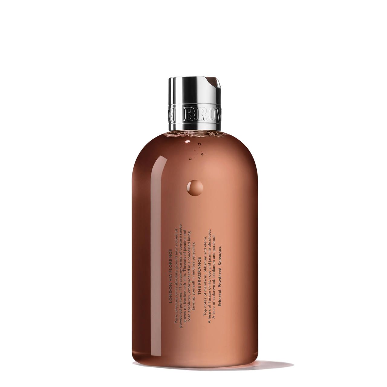 Rückseite einer braunen Flasche Molton Brown Suede Orris Bath & Shower Gel. Textbeschreibung der Inhaltsstoffe und Duftnoten.