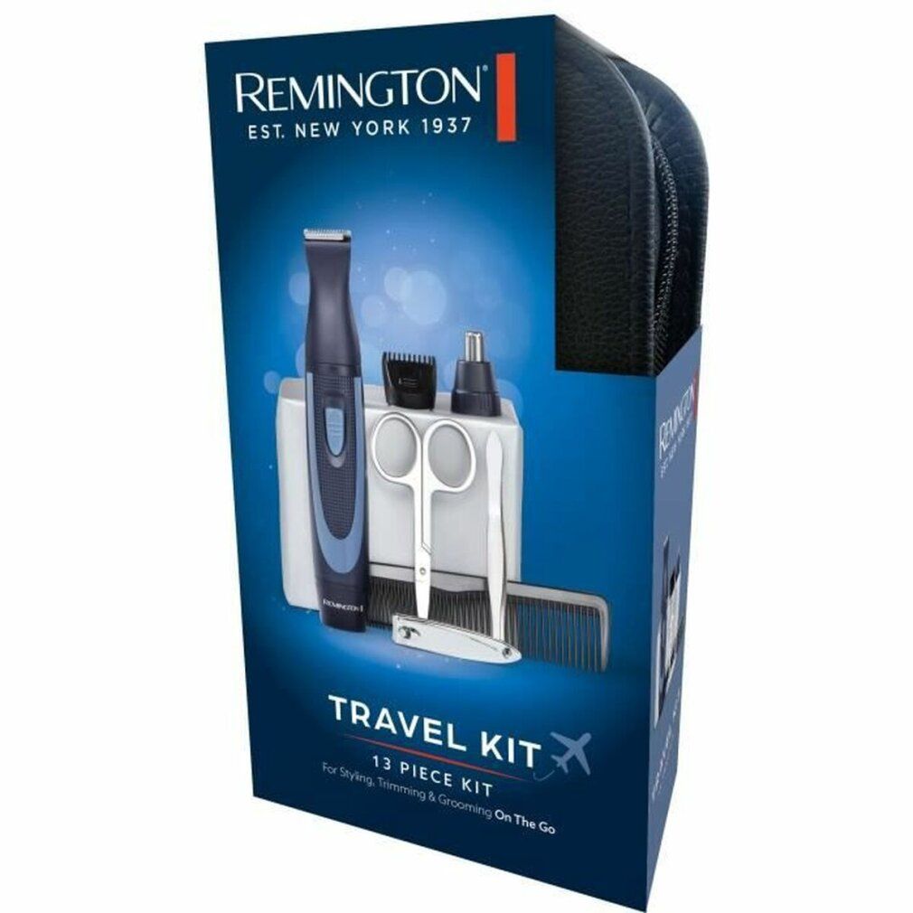Remington-Reise-Set in Verpackung. Enthält Trimmer, Aufsätze, Schere, Kamm, Pinzette. Schwarze Tasche. Text: TRAVEL KIT.