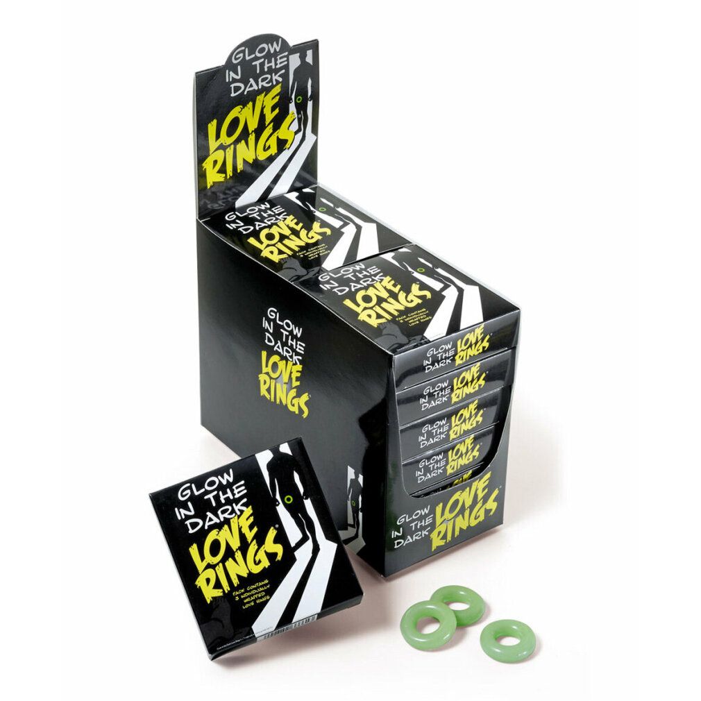 Produktpräsentation mit mehreren Verpackungen und drei leuchtenden Ringen. Verpackung mit Text: Glow in the Dark Love Rings.