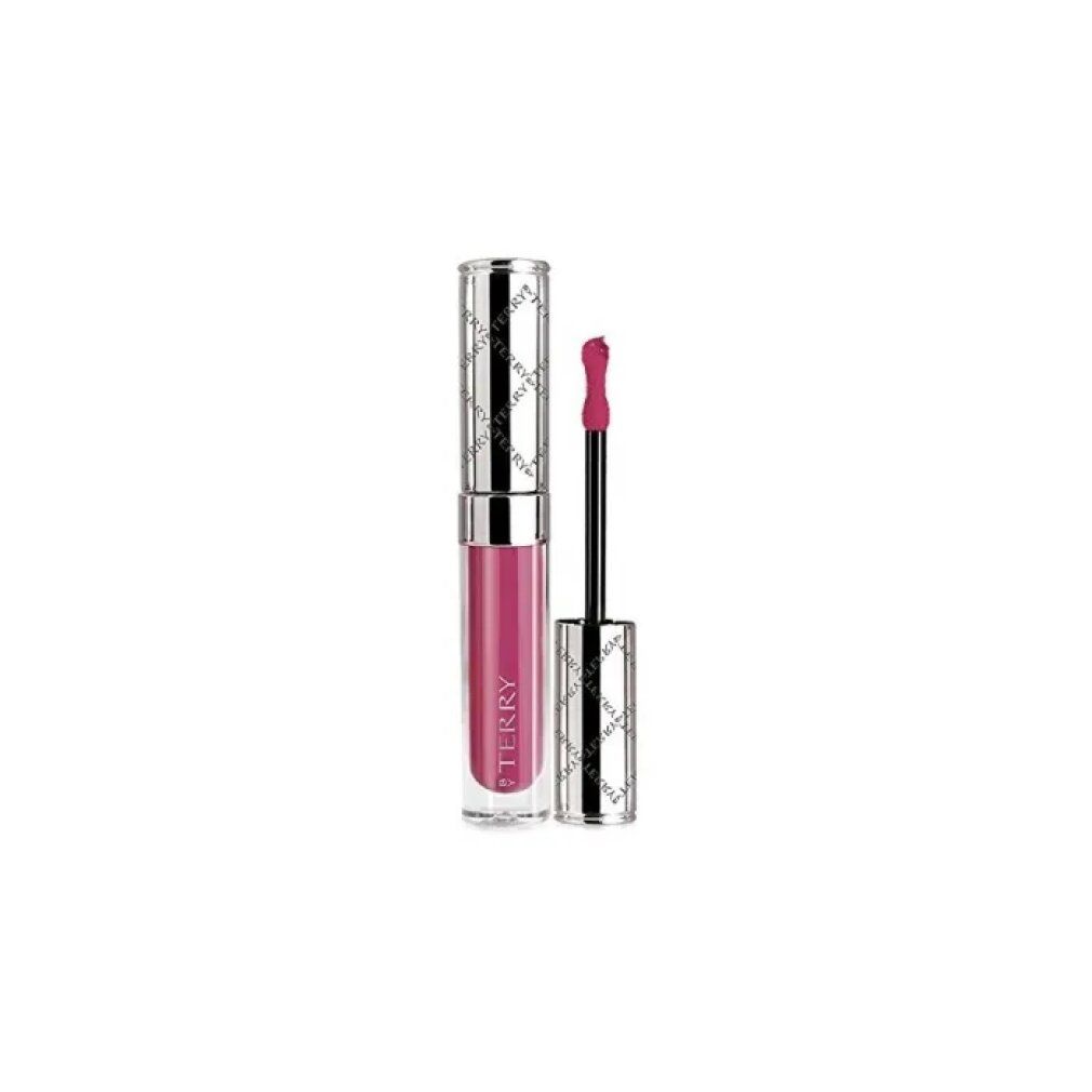 Lippenstiftflasche mit Applikator. Lila Lippenstift in einer transparenten Flasche mit silbernem Deckel. Applikator sichtbar.