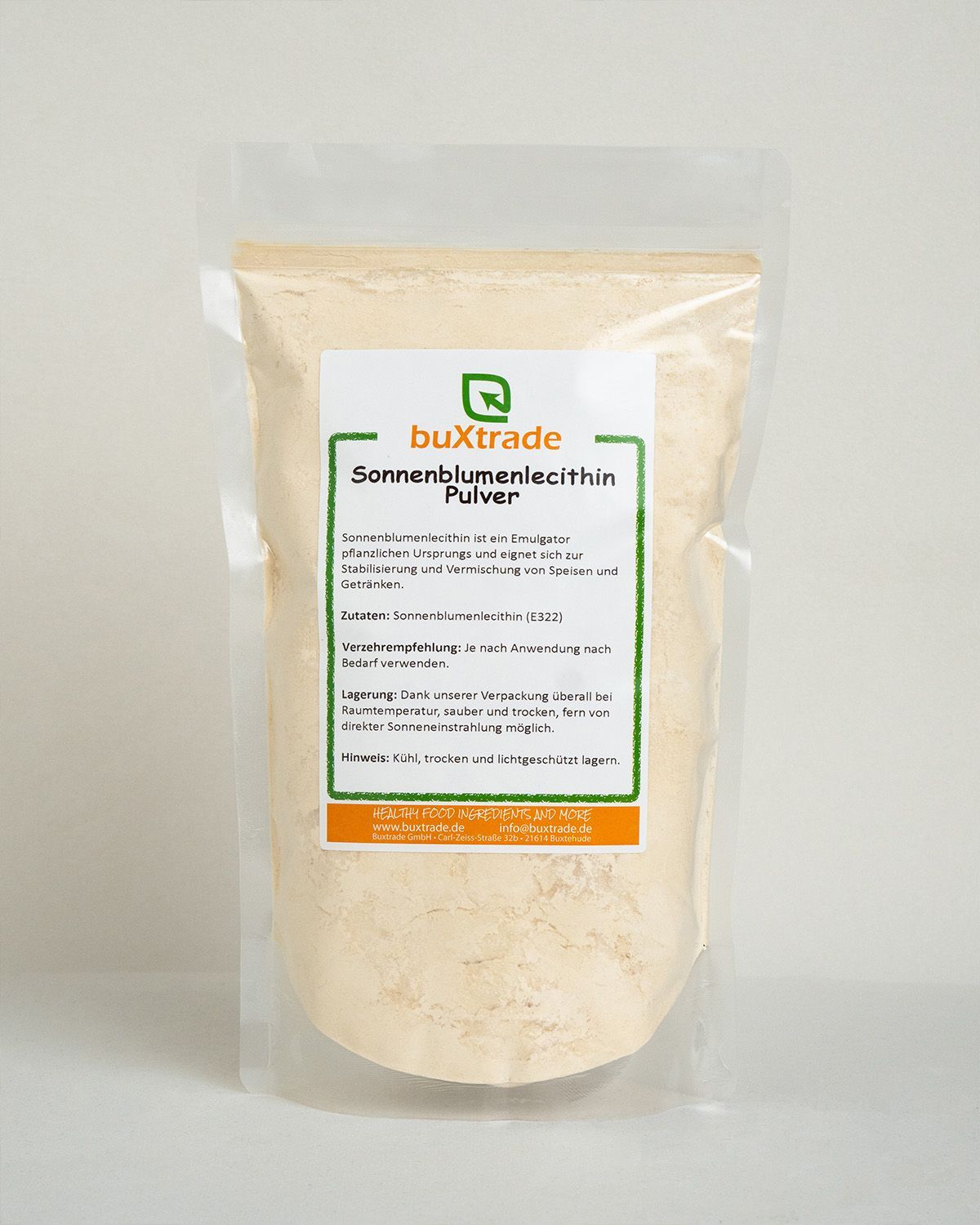 Verpackung mit buXtrade Sonnenblumenlecithin Pulver. Das Etikett enthält Produktinformationen und das Logo.