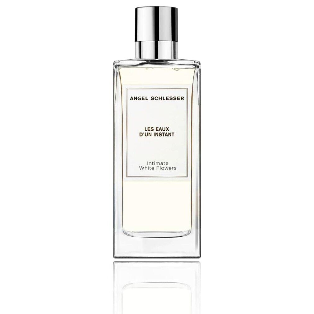 Rechteckiger Flakon mit silbernem Deckel. Aufschrift: Angel Schlesser, Les Eaux d'Un Instant, Intimate White Flowers.