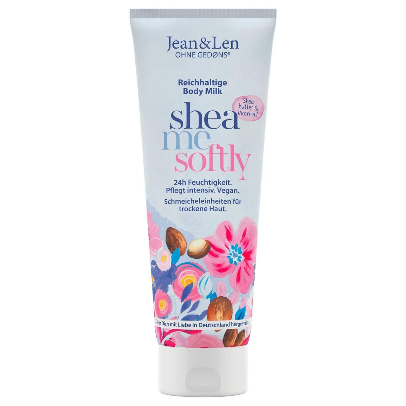 Weiße Tube mit Produktaufdruck. Text: Jean & Len, Body Milk, shea me softly. Mit Shea Butter & Vitamin E. Für trockene Haut.