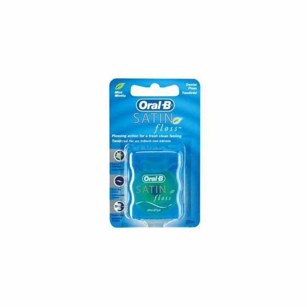 Blisterkarte mit blauem Zahnseide-Behälter. Aufschrift: Oral-B Satin Floss. 25 m.