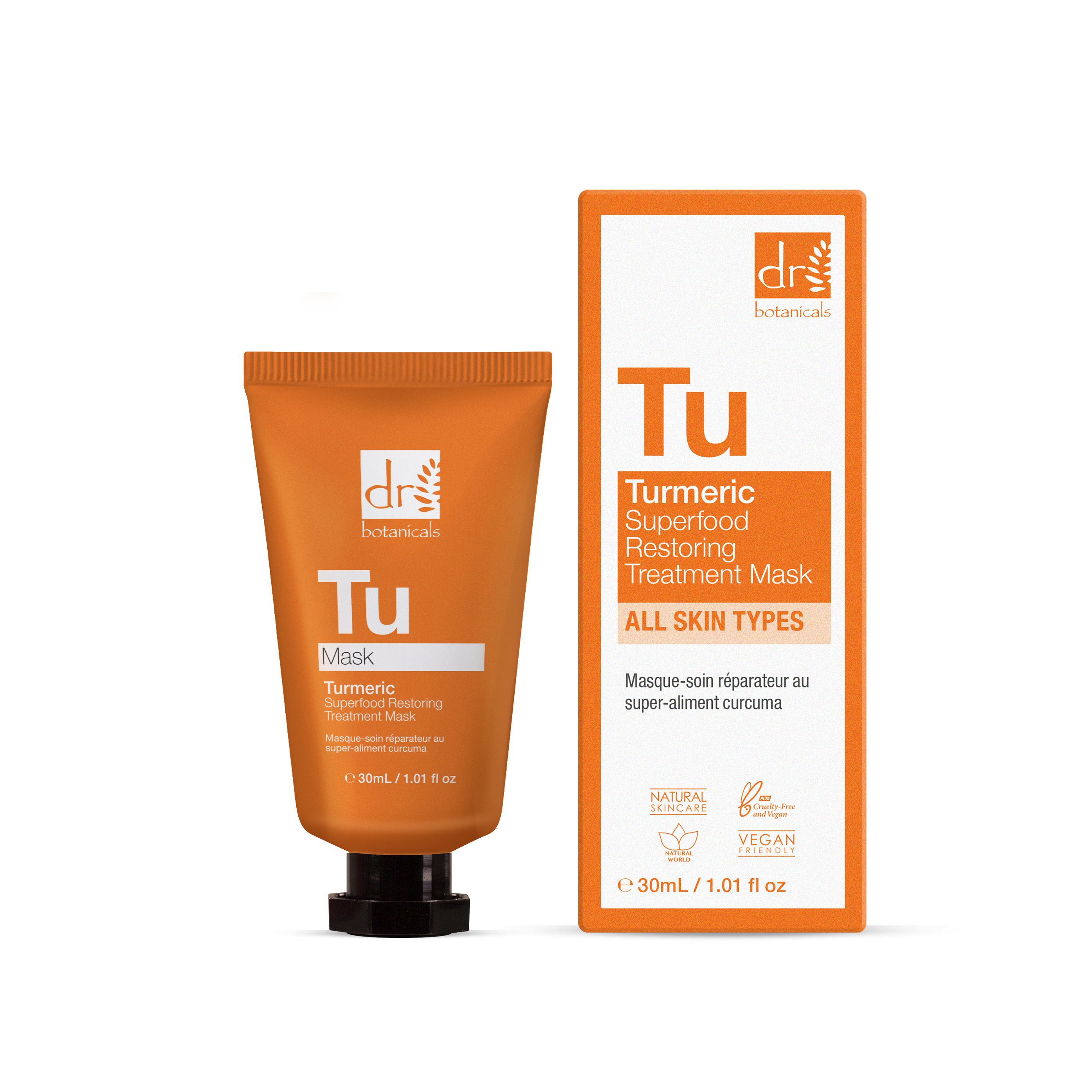 Orange Tube mit schwarzem Verschluss und Karton. Aufschrift: Tu Mask, Turmeric Superfood Restoring Treatment Mask. Vegan-Siegel.