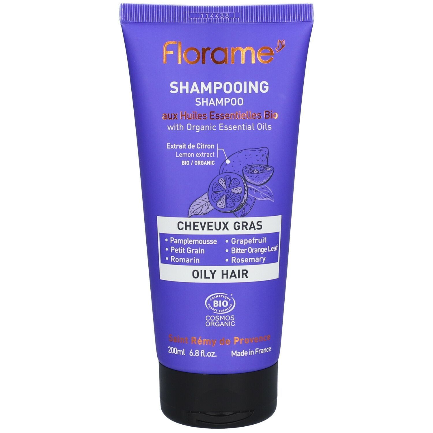 Violette Tube mit Florame Shampoo für fettiges Haar. Text: "Huiles Essentielles Bio", "Cheveux Gras", "200ml".