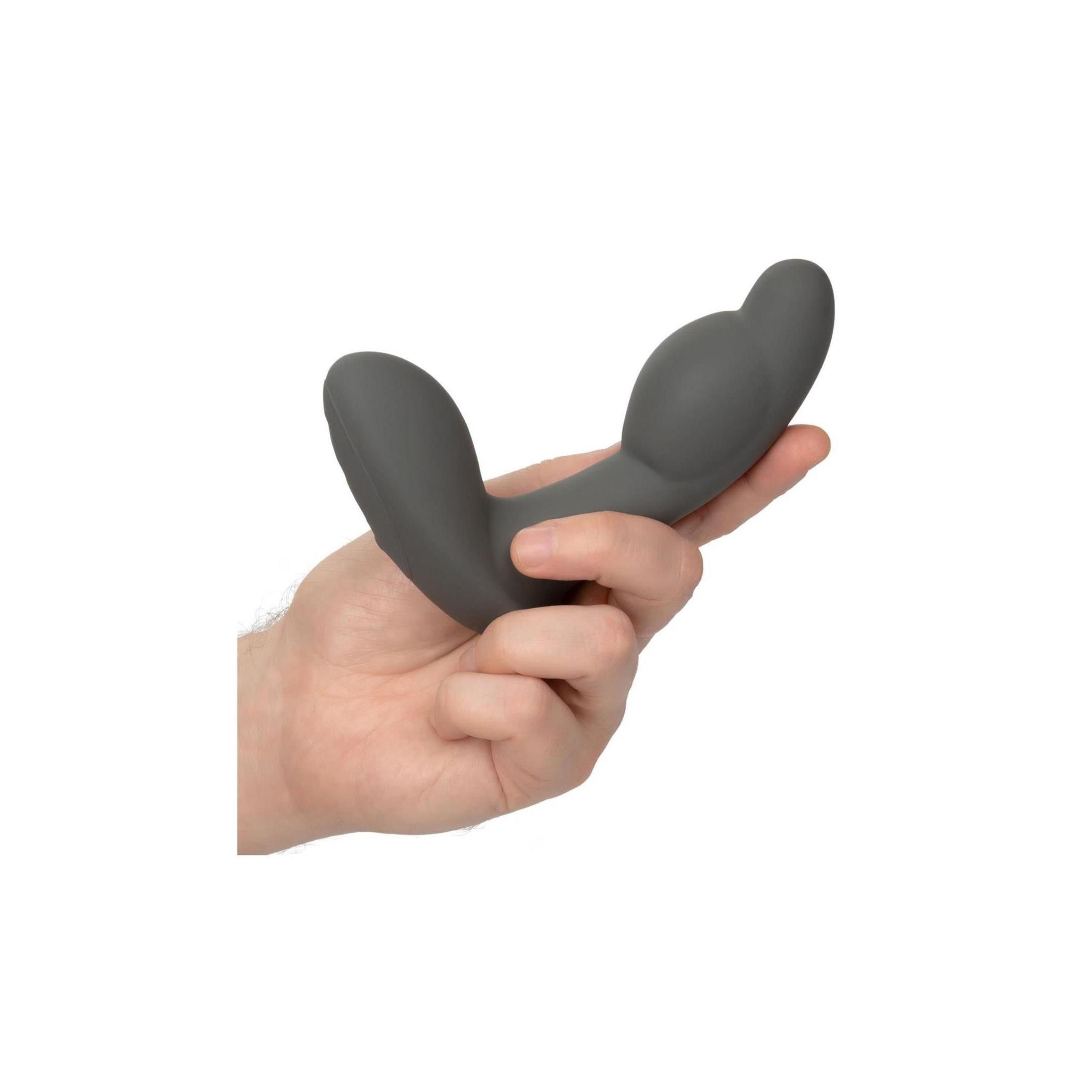Graue, gebogene Sonde in einer Hand gehalten. Produktmerkmal: gebogene Form.