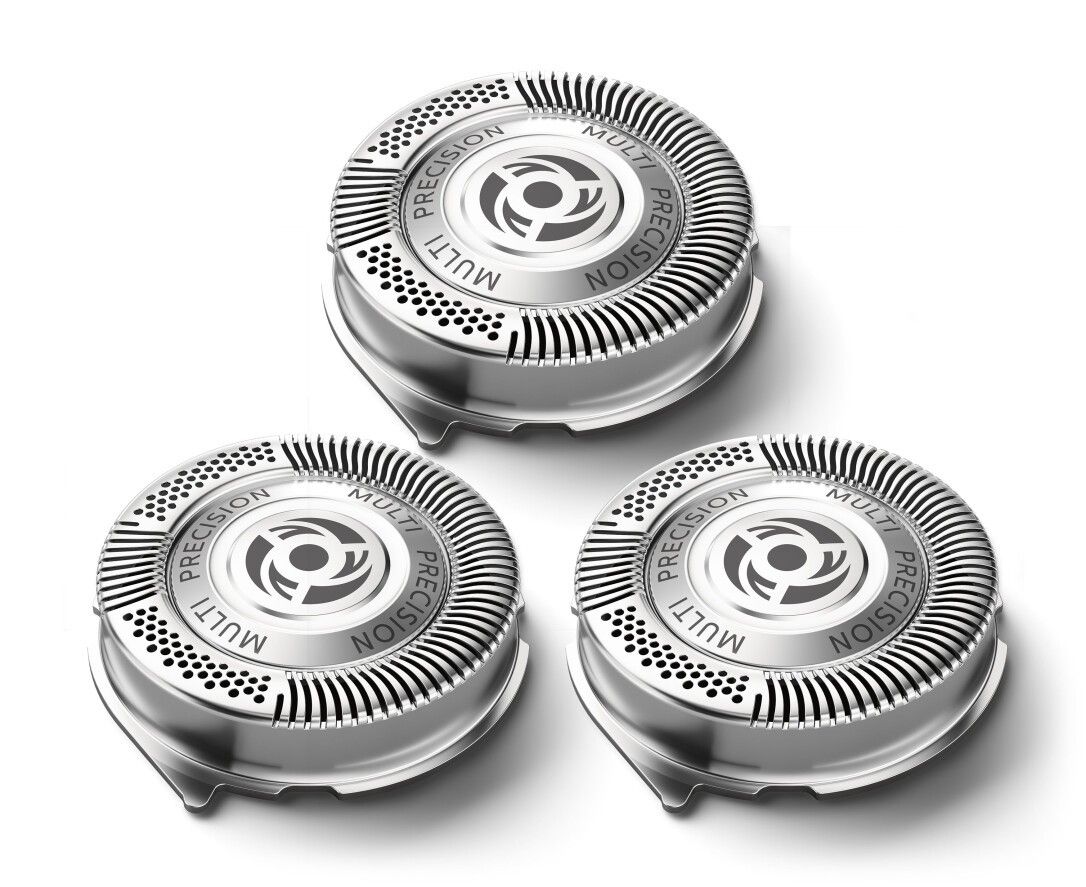 Drei silberfarbene Rasierköpfe. Jeder Kopf hat einen runden, metallischen Scherkopf mit dem Schriftzug 'Multi Precision'.