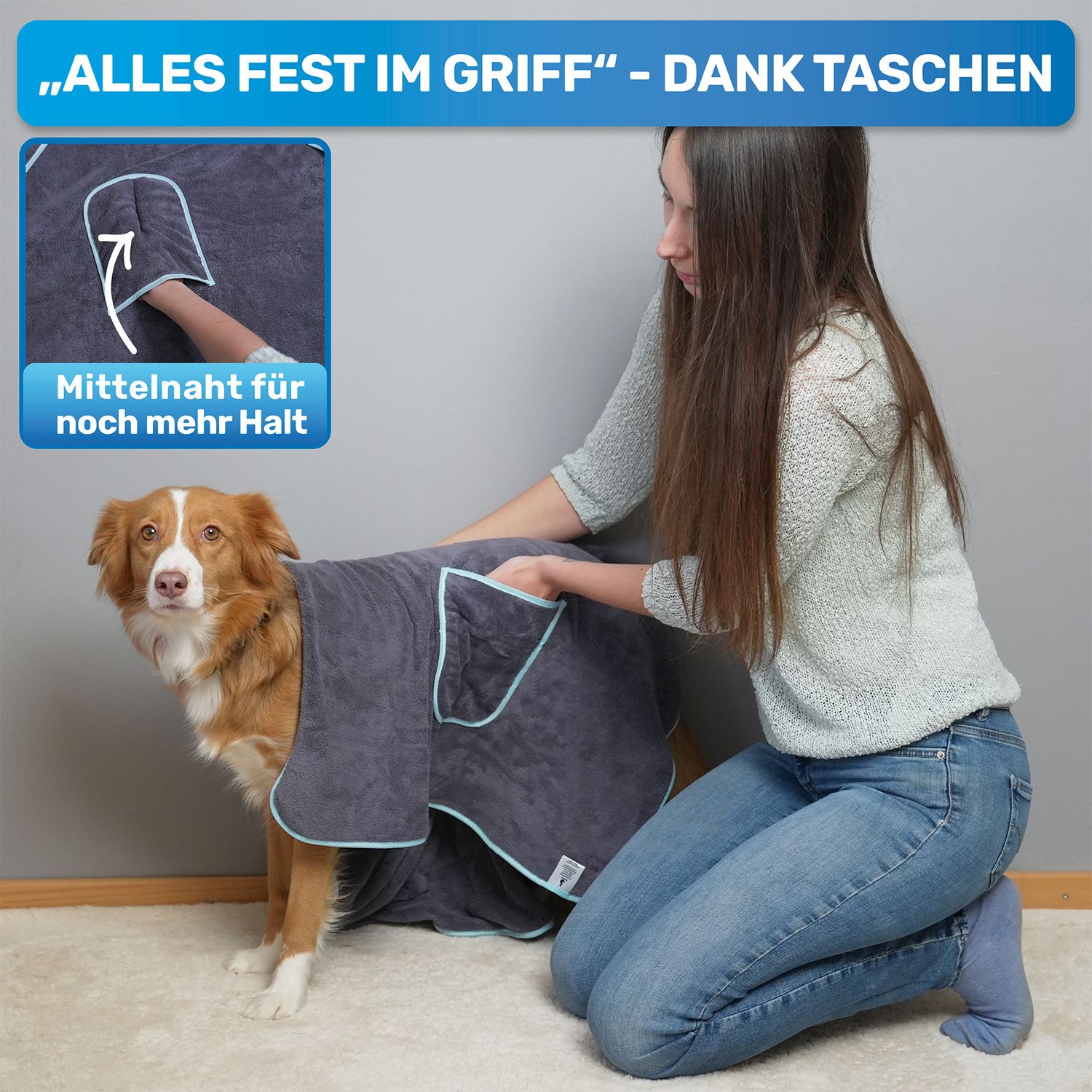 Graues Hundehandtuch mit blauer Einfassung. Eine Frau legt es einem Hund an. Taschen für besseren Halt.