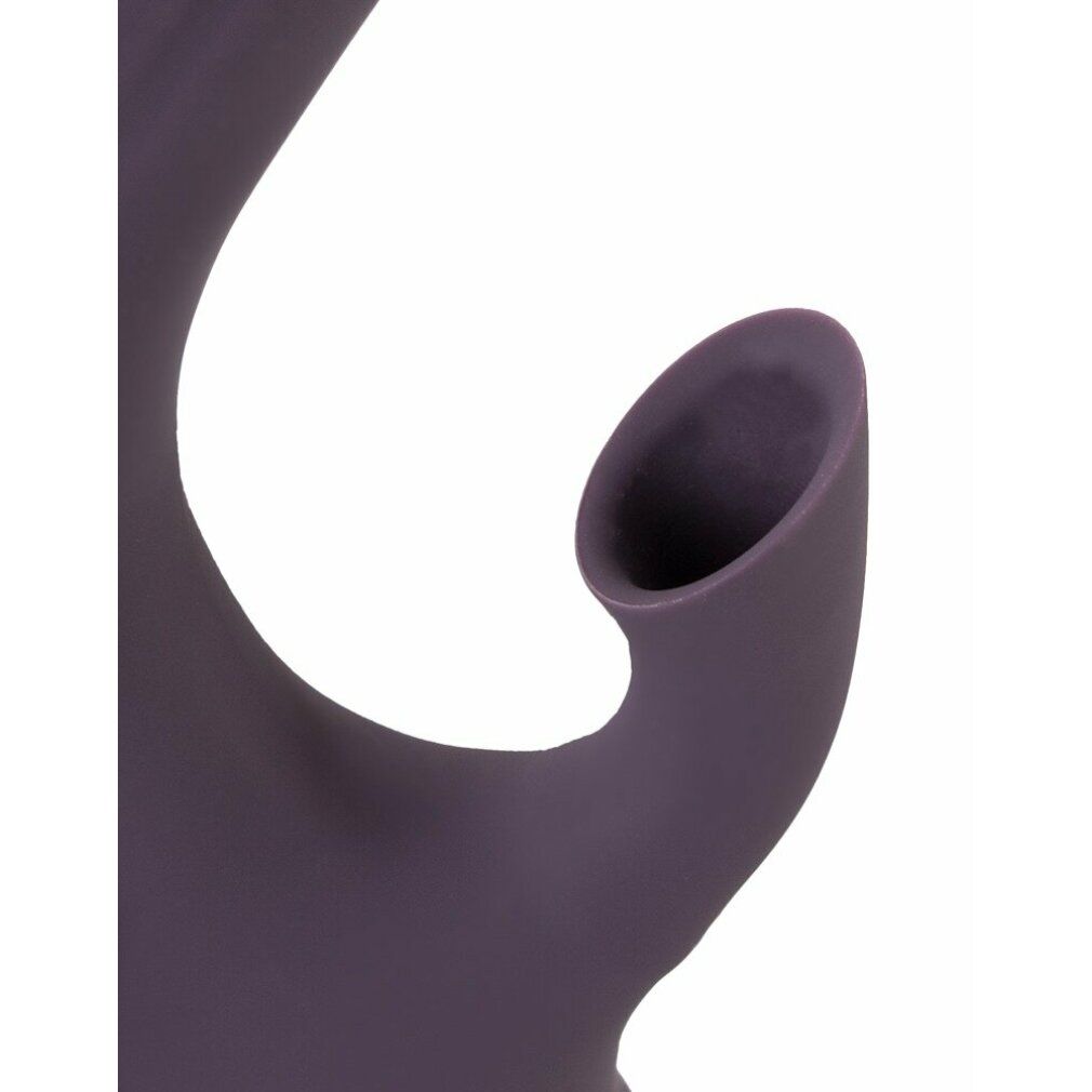 Nahaufnahme einer Öffnung an einem lila Vibrator. Glatte Oberfläche.