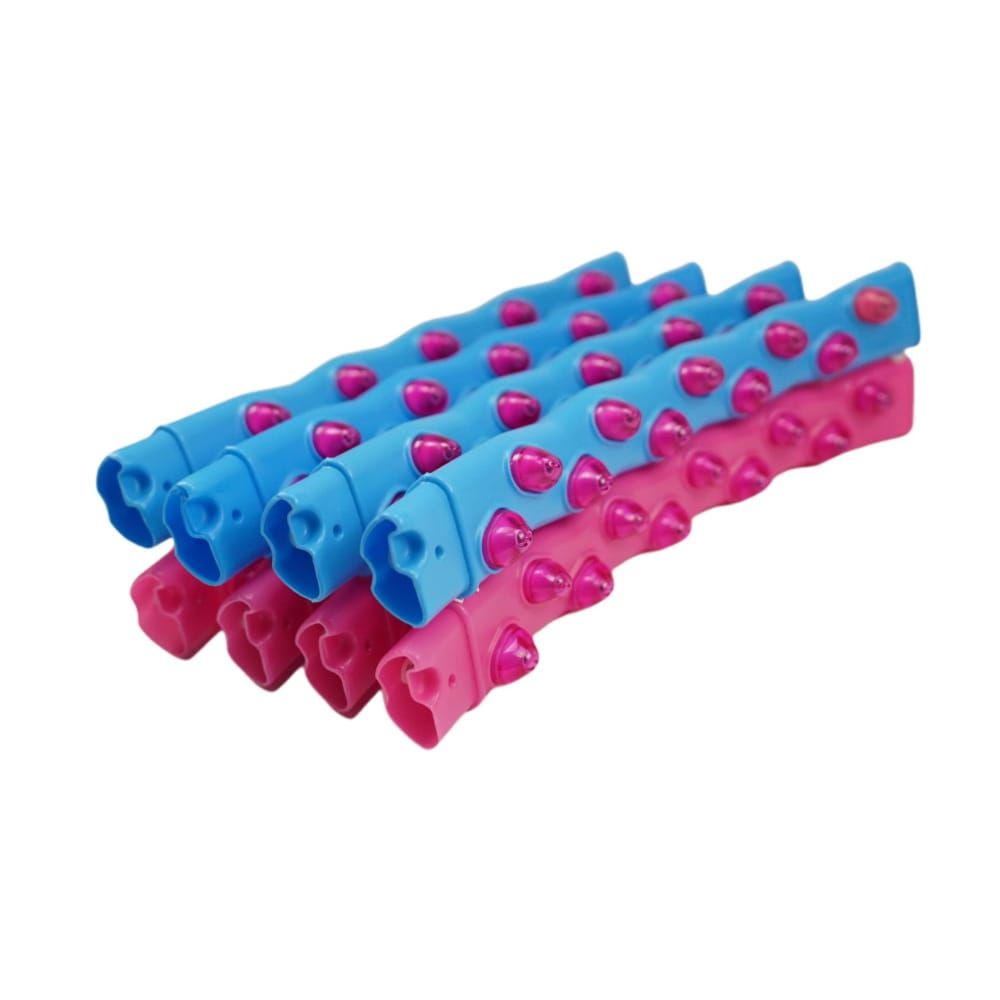 Mehrere Segmente eines Hula-Hoop-Reifens. Pinke und blaue Elemente mit Massage-Noppen. Einzeln angeordnet.