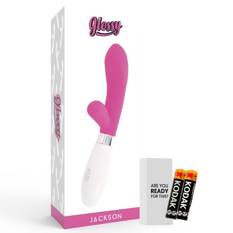 Verpackung mit pinkfarbenem Vibrator. Auf der Verpackung steht "Glossy" und "Jackson". Zwei Batterien und eine Box mit Text.