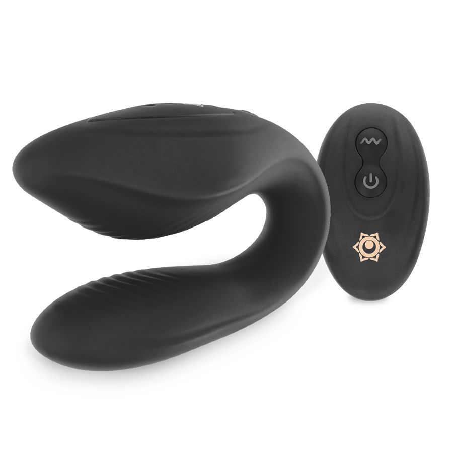 Schwarzer Rithual Kama Vibrator mit Fernbedienung. Der Vibrator hat eine U-Form und die Fernbedienung ist oval.
