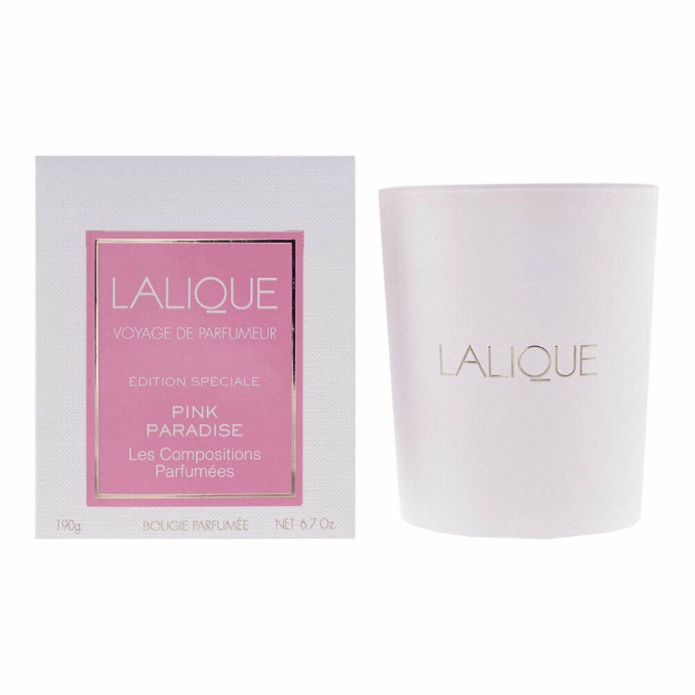 Weiße Kerze und Verpackung. Rosa Etikett mit Text: LALIQUE, Pink Paradise, Les Compositions Parfumées. Goldener Schriftzug.