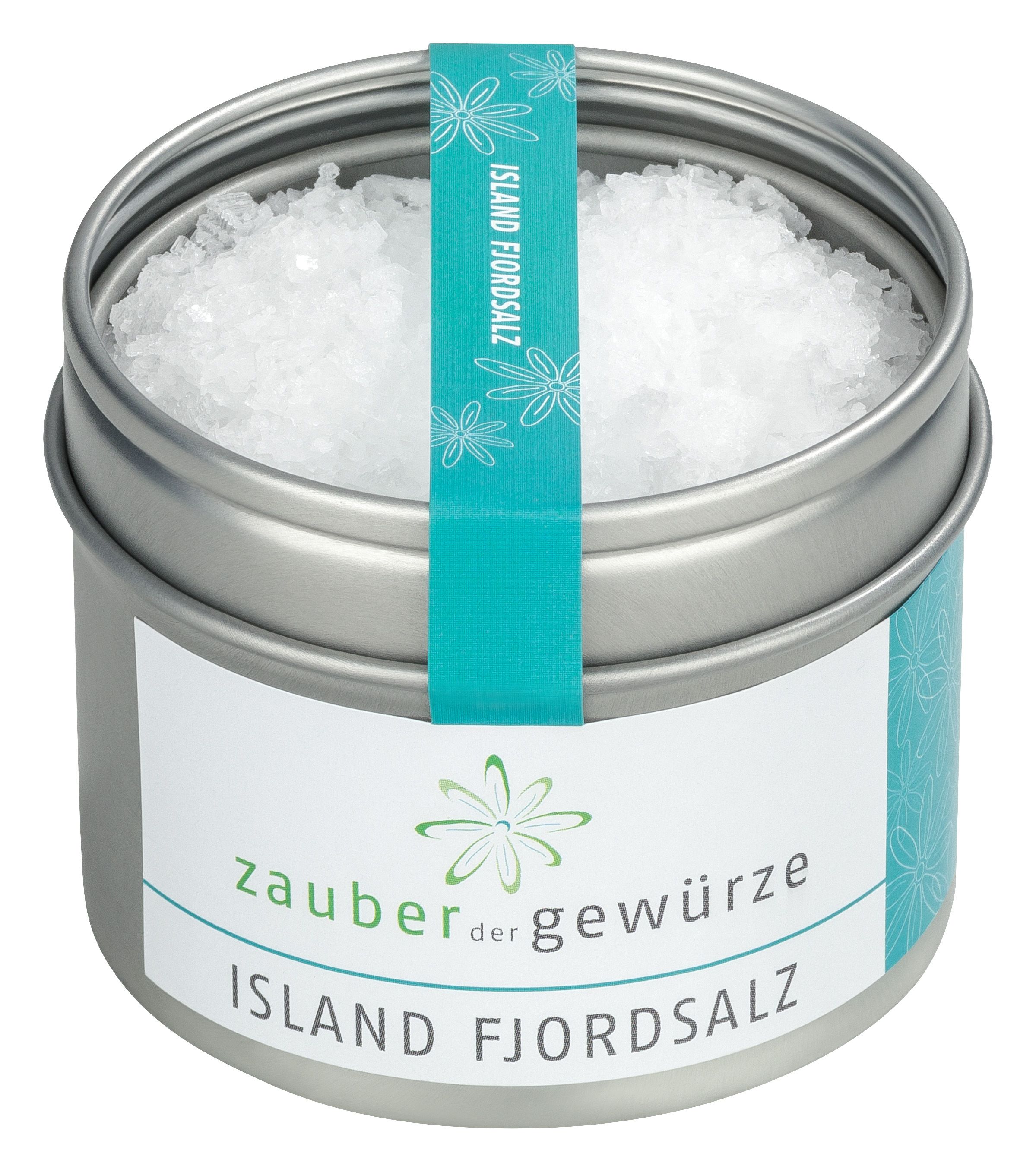 Runde Dose mit Salz. Aufschrift: Zauber der Gewürze Island Fjordsalz. Türkisfarbenes Band mit floralem Muster.