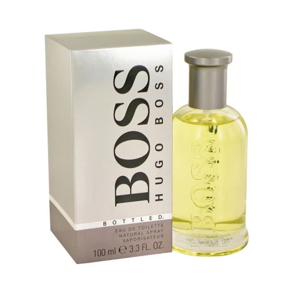 Flakon und Verpackung von HUGO BOSS Bottled. Flakon mit silbernem Deckel, helle Flüssigkeit. Verpackung mit BOSS-Schriftzug.