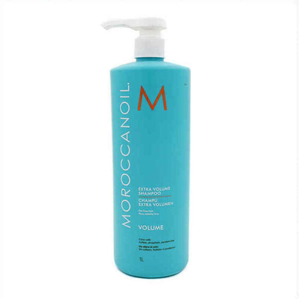 Türkisgrüne Shampoo-Flasche mit weißem Pumpkopf. Aufschrift: Moroccanoil, Volume, Extra Volumen Shampoo.