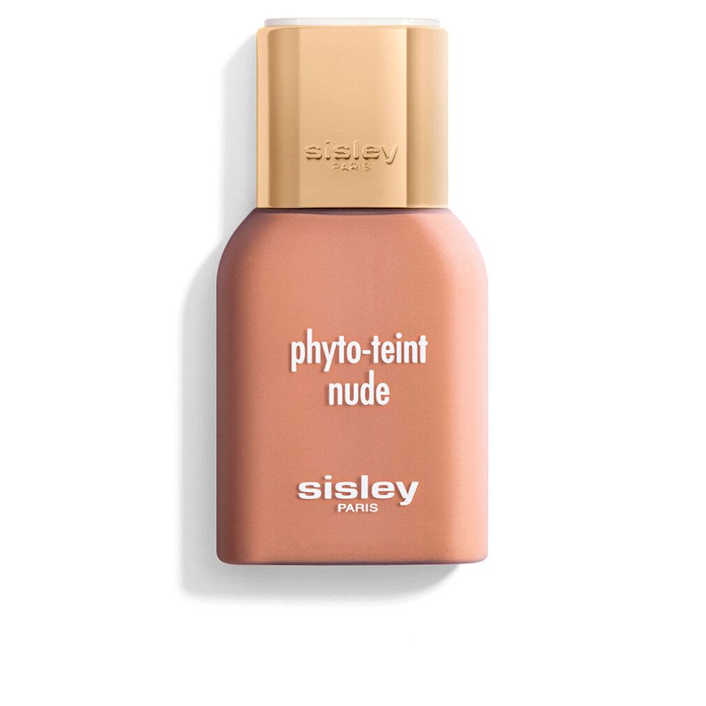 Sisley Phyto-Teint Nude. Flasche mit beigefarbener Flüssigkeit, goldfarbener Deckel. Schriftzug: Sisley Paris, Phyto-Teint Nude.