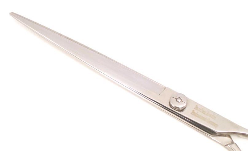 Detailansicht der Hunde Haarschere 25 cm. Silberfarbenes Metall, scharfe Klinge, Schraubverbindung.
