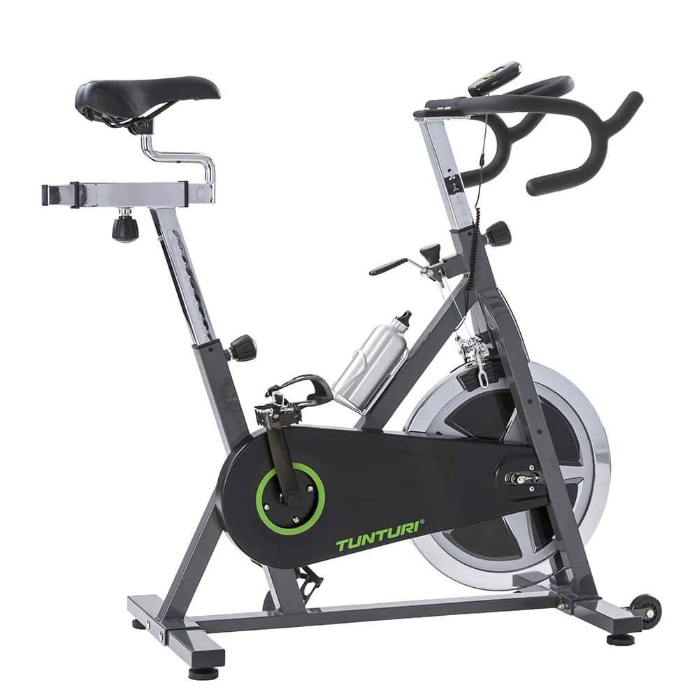 Indoor Cycle mit Sattel, Lenker, Pedalen und Trinkflaschenhalterung. Das Gerät ist grau und schwarz, mit dem Markennamen Tunturi.