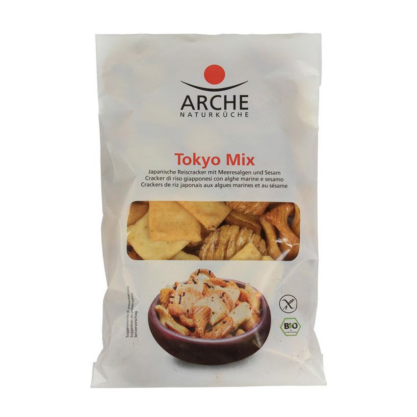 Verpackung mit Arche Tokyo Mix Reiscrackern. Sichtfenster zeigt Cracker. Logo: Arche Naturküche. Text: Tokyo Mix, glutenfrei, Bio-Siegel.