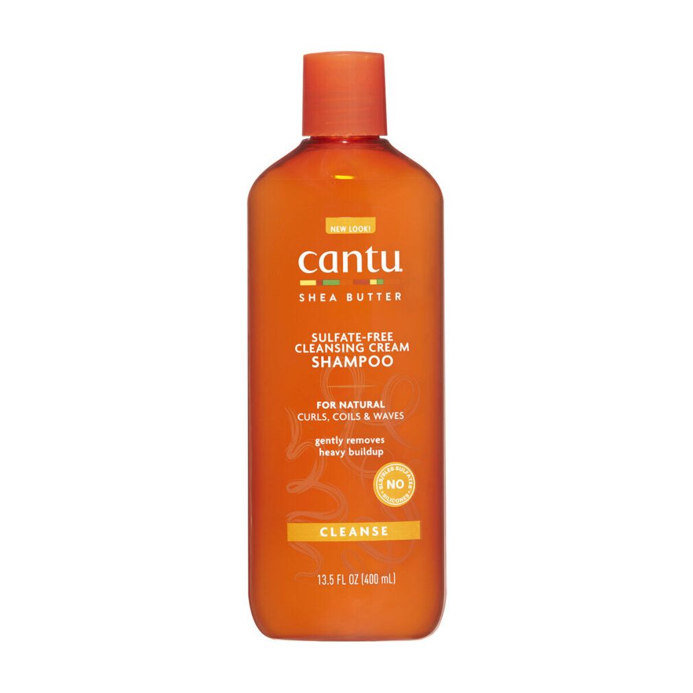 Orangefarbene Cantu-Shampooflasche. Aufschrift: Sulfate-Free Cleansing Cream Shampoo. Für Locken, Coils & Waves. 400ml.