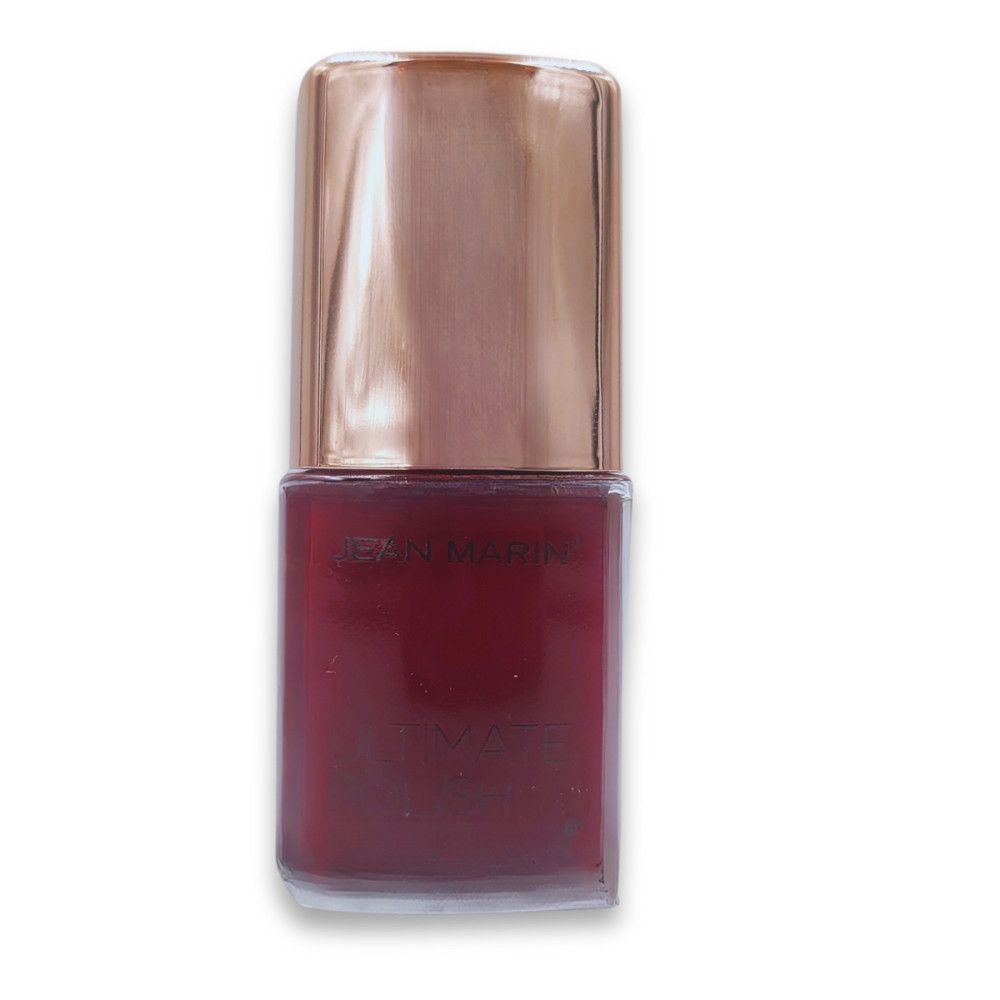 Nagellackflasche. Jean Marin Ultimate. Dunkelroter Nagellack in einer quadratischen Glasflasche mit roségoldener Kappe.