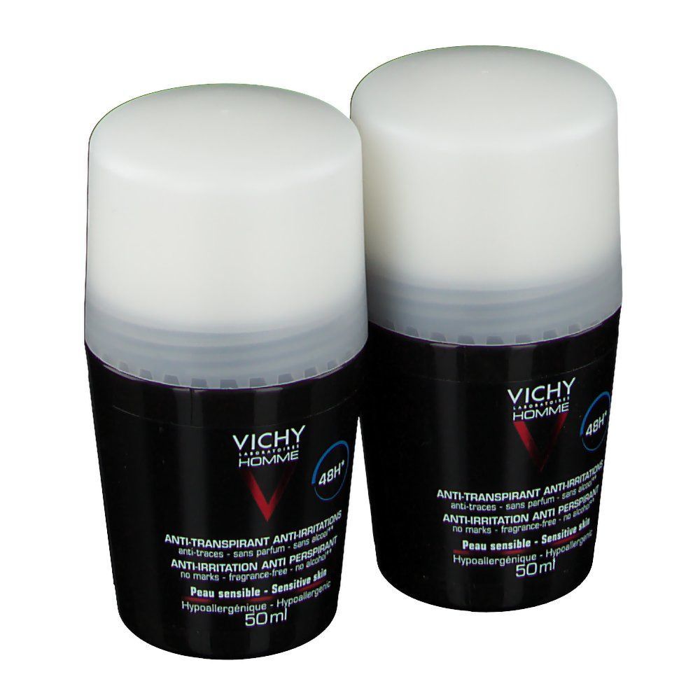 Deux déodorants roll-on noirs et blancs. Inscription Vichy Homme, 48H, Antitranspirant. Peau sensible.