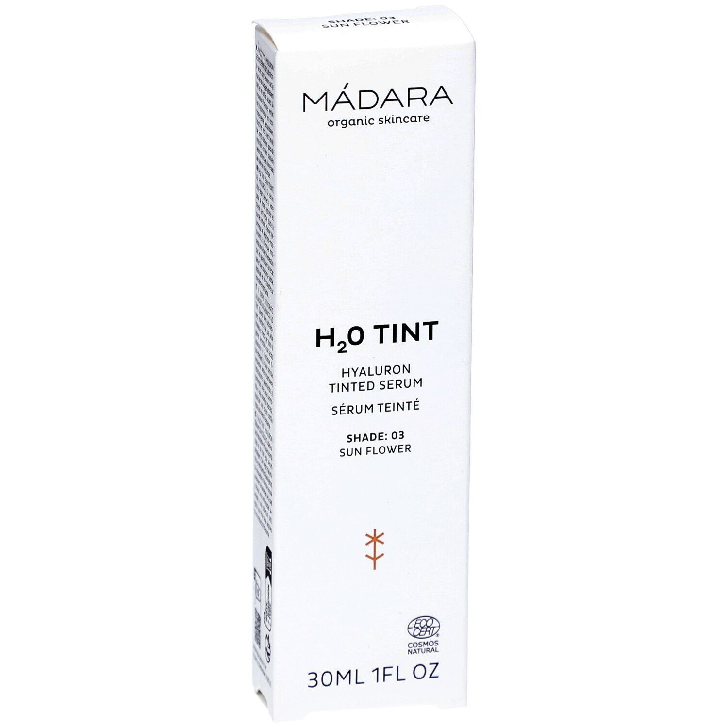 Weiße Verpackung mit Produktinformationen. Schriftzug: MÁDARA, H2O TINT, Hyaluron Tinted Serum, Shade: 03 Sun Flower. 30ml 1FL OZ.