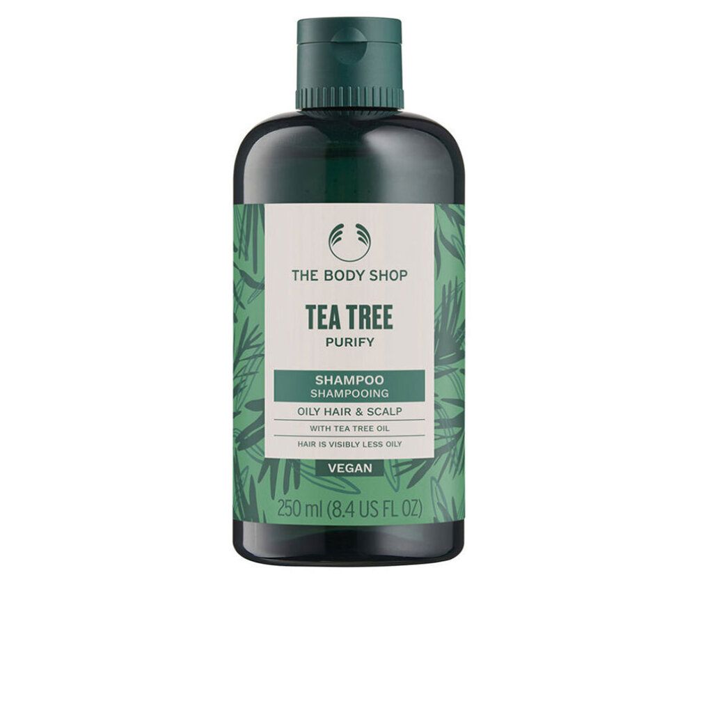 Grüne Shampoo-Flasche. Aufschrift: Tea Tree, Shampoo, für fettiges Haar und Kopfhaut. Vegan. 250 ml.