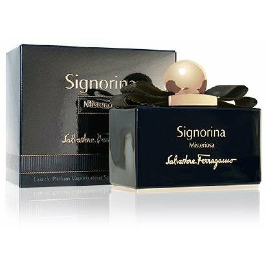 Schwarzer Karton und Flakon. Aufschrift Signorina Misteriosa und Salvatore Ferragamo. Flakon mit goldfarbenem Verschluss.
