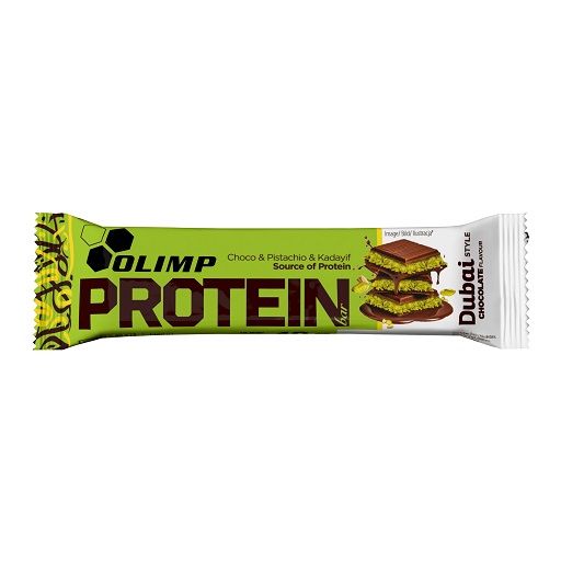 Olimp Protein Bar Dubai Chocolate. Grün-weiß verpackter Riegel. Aufdruck: Protein, Dubai Style, Schoko-Pistazie.